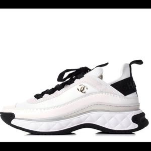 Chic CHANEL sneakers. Perfect for any outfit upgrade.